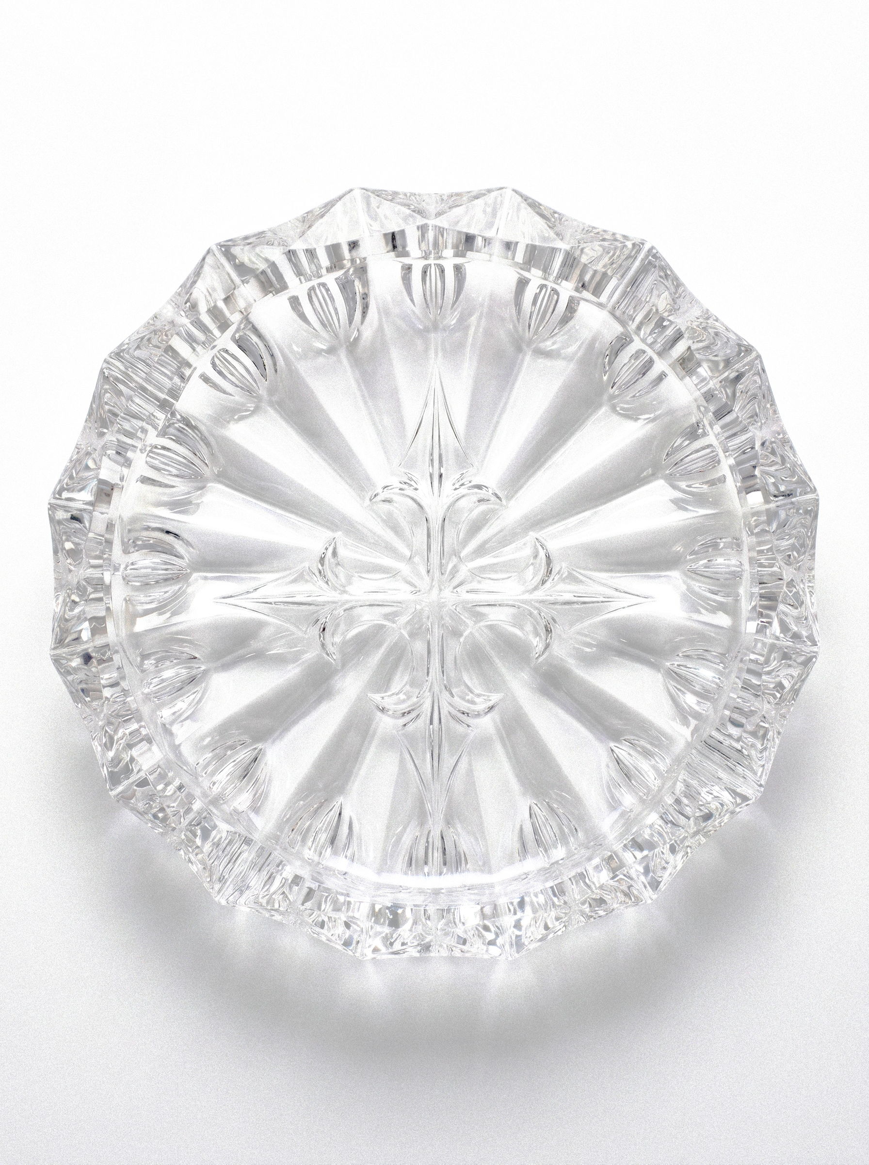 SOFTBLADES STARBURST CUT GLASS ASHTRAY