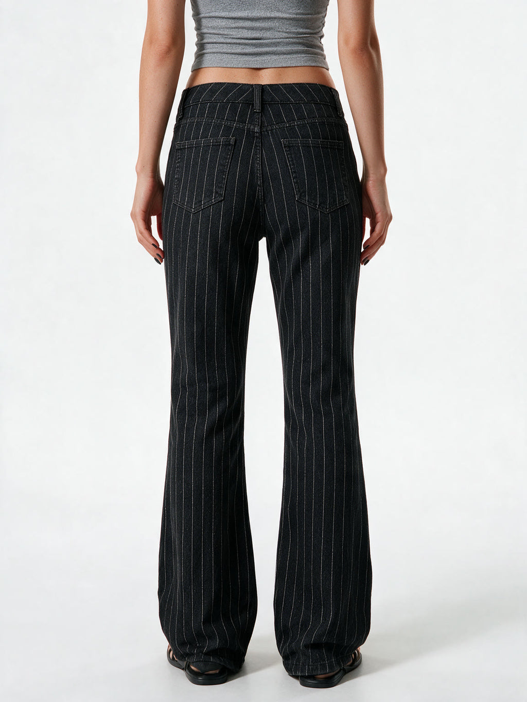 Black pinstripe low rise bootcut trousers