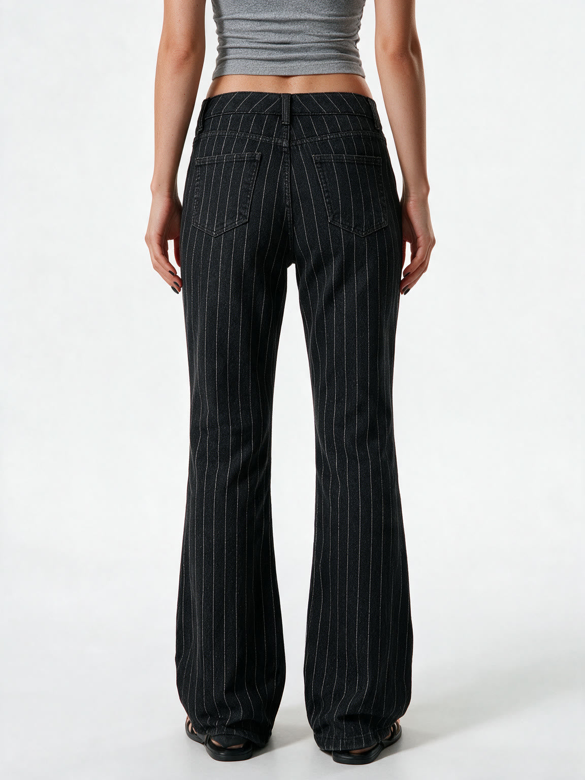 Black pinstripe low rise bootcut trousers