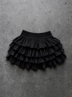 CROSS CHARM TIERED MINI SKIRT