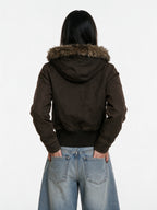 Brown cropped aviator jacket with a faux fur hood