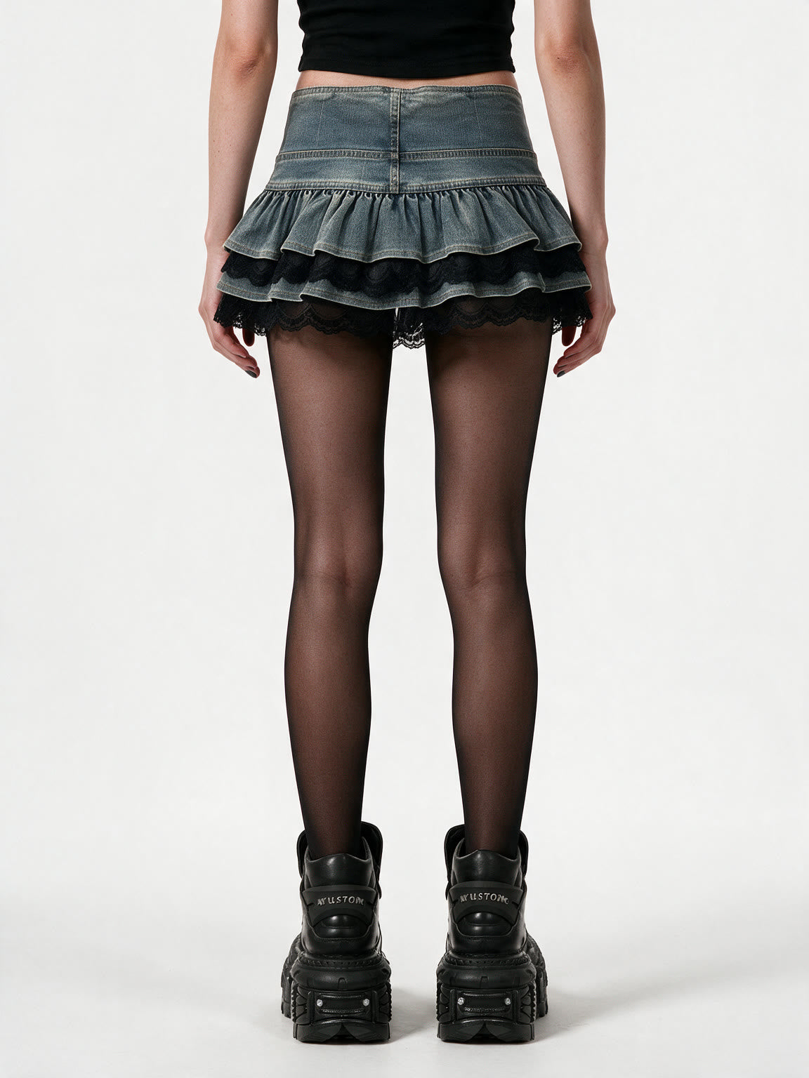Washed denim tiered mini skirt with black lace trim