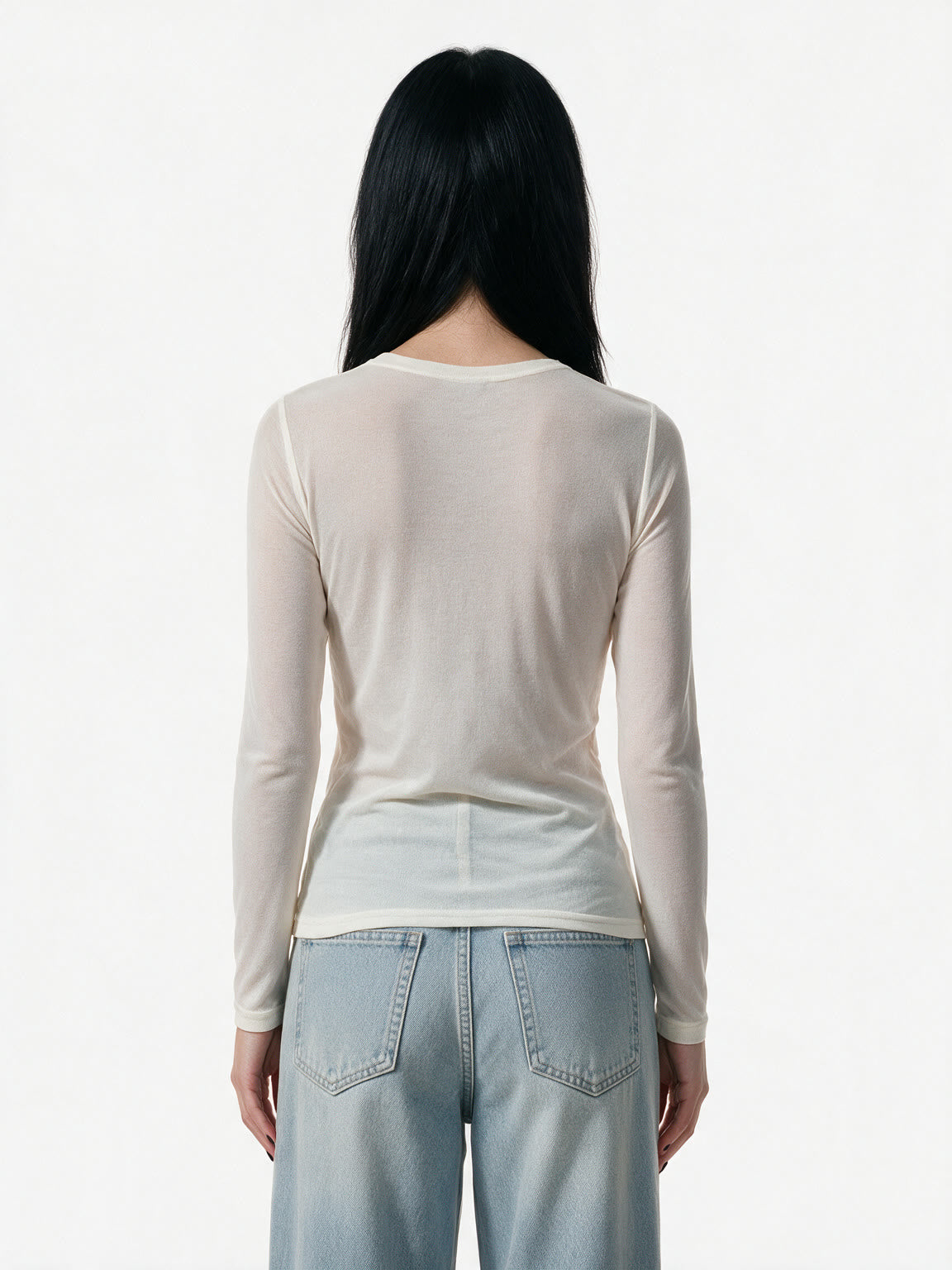 Cream long sleeve tee printed with a magazine style photo spread