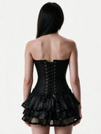 Black brocade corset with a layered satin tutu skirt