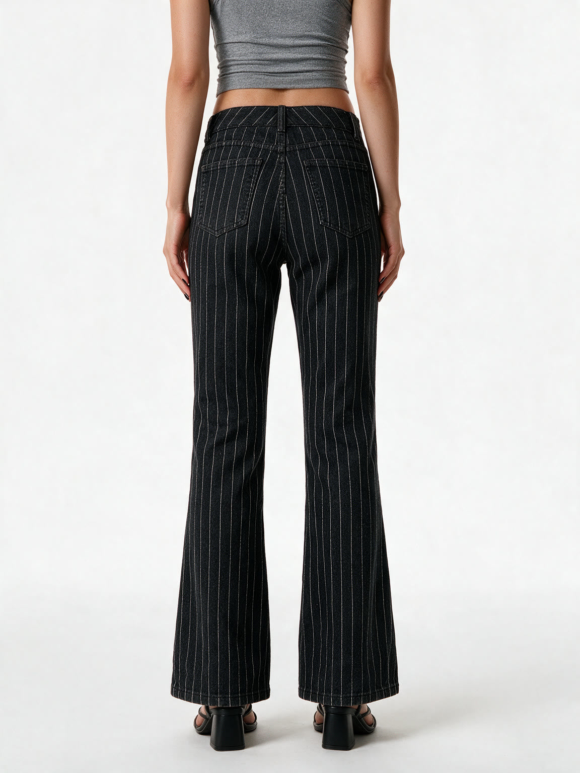 Black pinstripe low rise bootcut trousers
