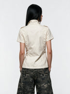 Cream short sleeve military style button top