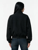 Black stand collar jacket with silver toggle clasps