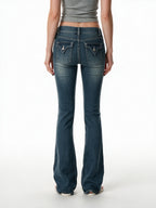 Blue baggy jeans with embroidered pockets