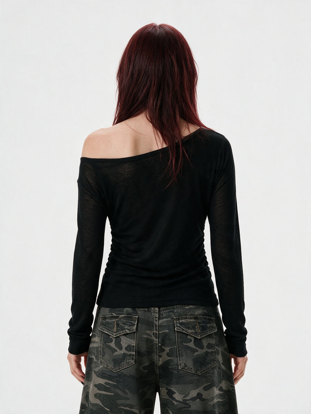 Black ruched long sleeve top printed with chains and crosses