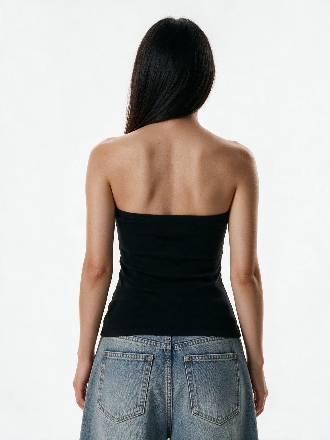 Black strapless tube top with a winged print