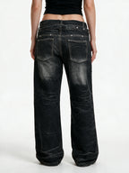 Dark washed flare jeans with a double laced waistband