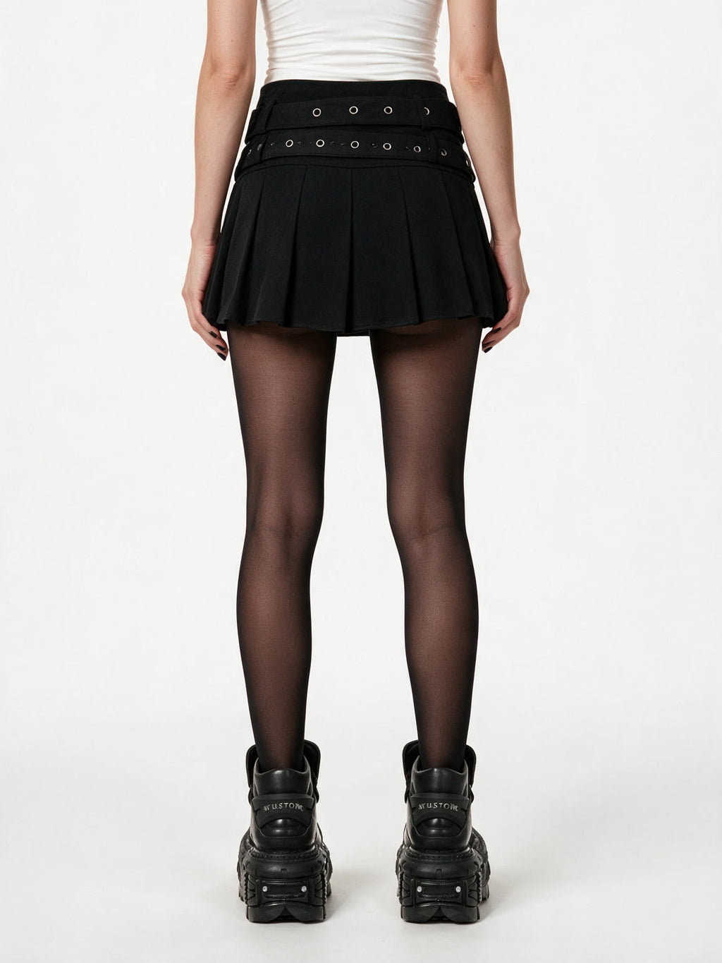 Black pleated mini skirt with two buckled eyelet belts
