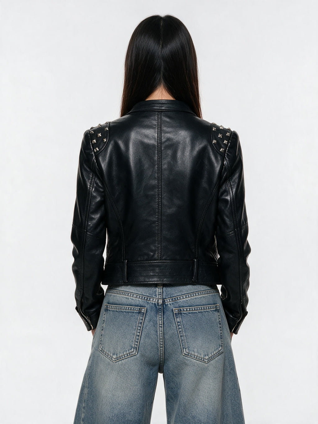 Cropped black leather moto jacket with studded shoulders
