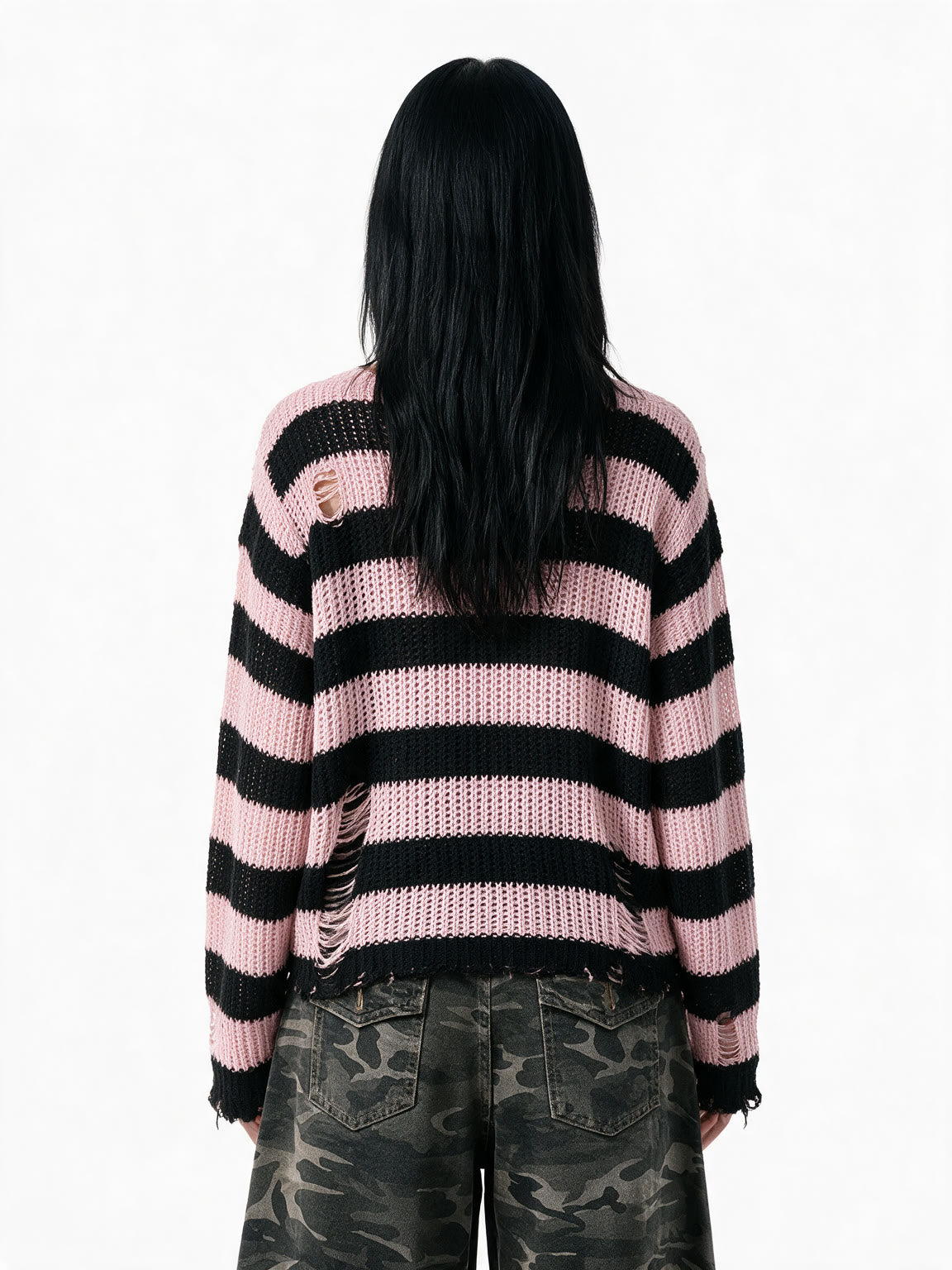 Oversized pink and black striped distressed knit sweater