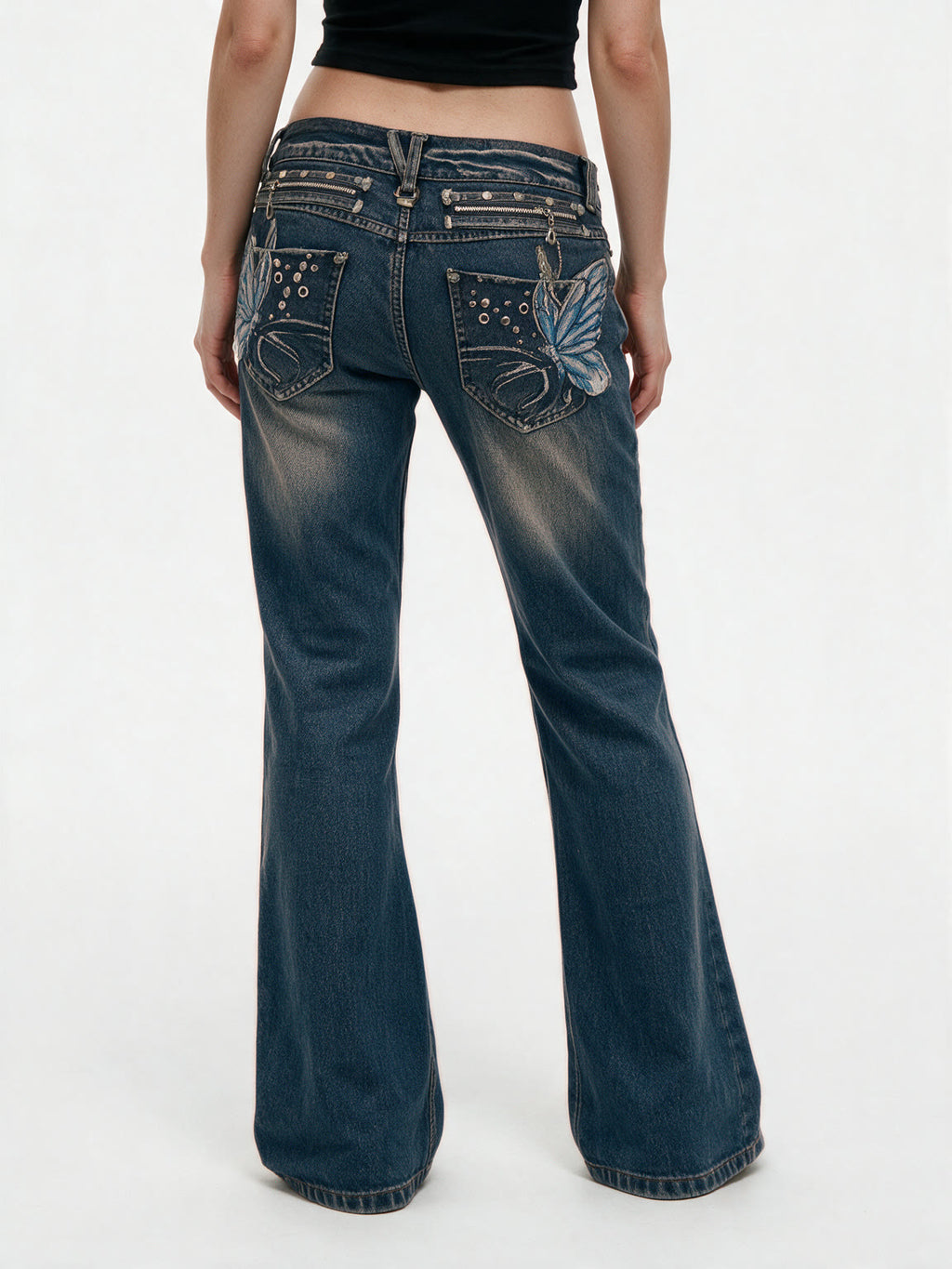 Blue bootcut jeans with crystal set back pockets