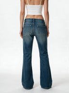 Blue wide leg jeans with a crystal set waistband