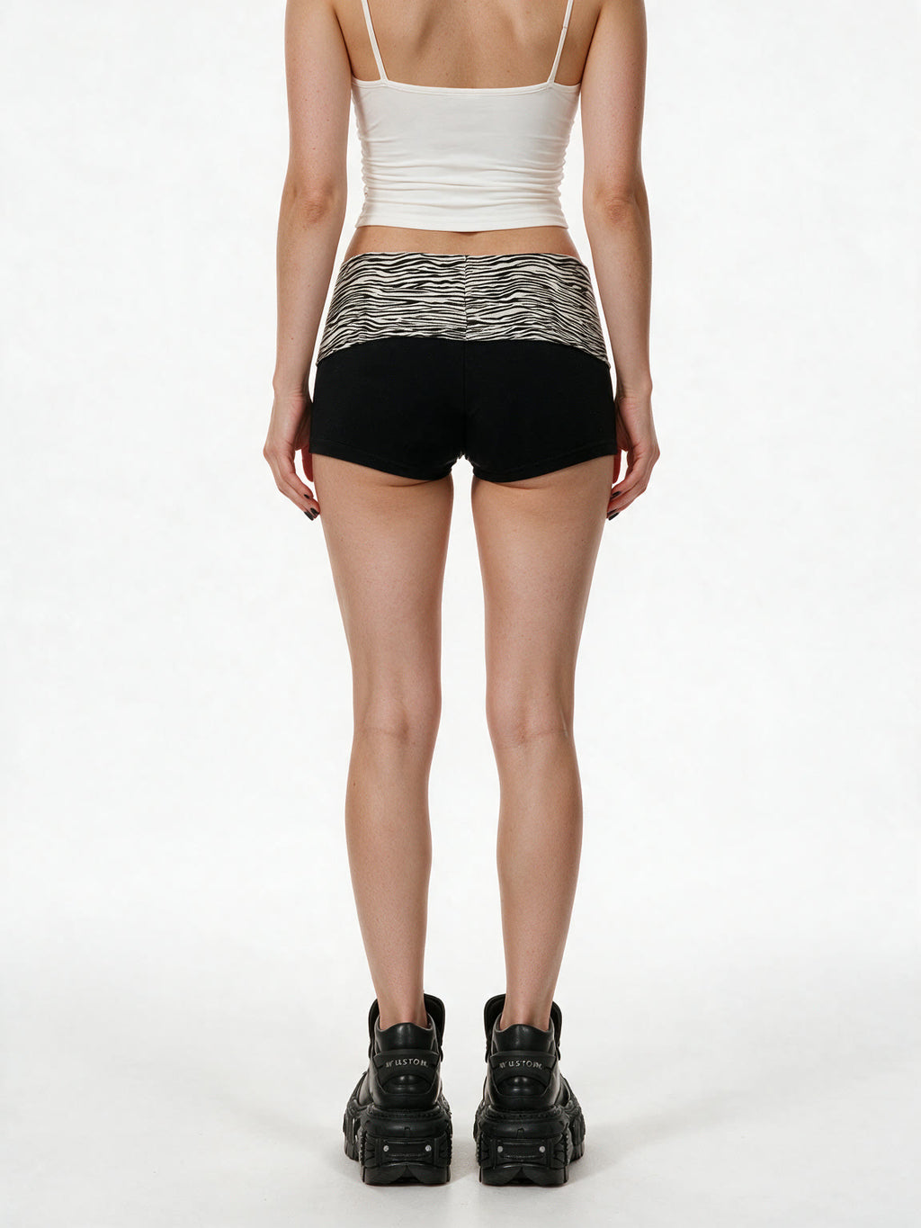 Black hot shorts with a zebra print waistband