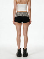 Black hot shorts with a zebra print waistband