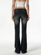 Faded black bootcut jeans