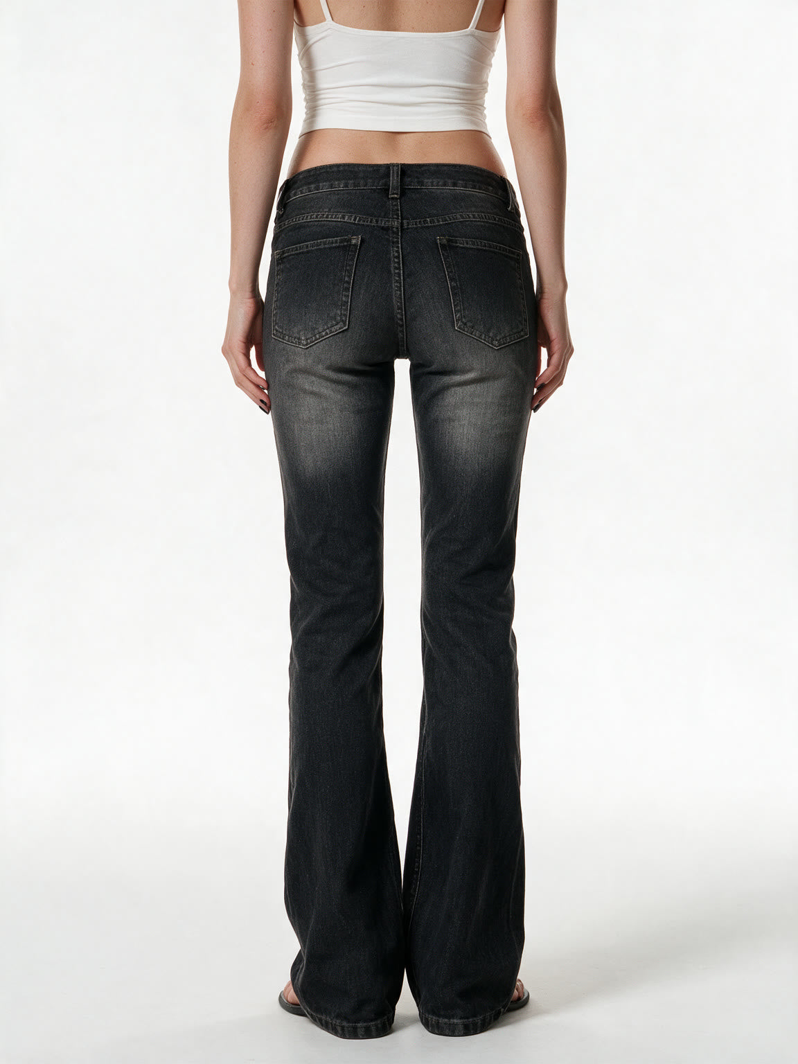 Faded black bootcut jeans
