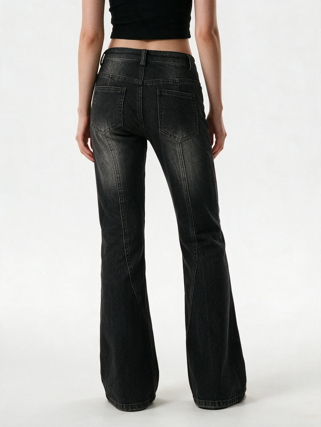 Washed black flare jeans with an asymmetric waistband