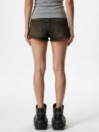 Brown washed denim shorts with zipped pockets