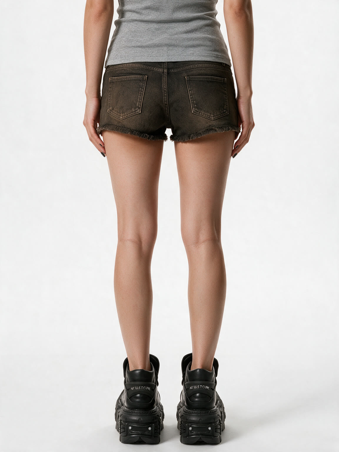 Brown washed denim shorts with zipped pockets