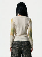 Cream long sleeve tee with a large anime face print