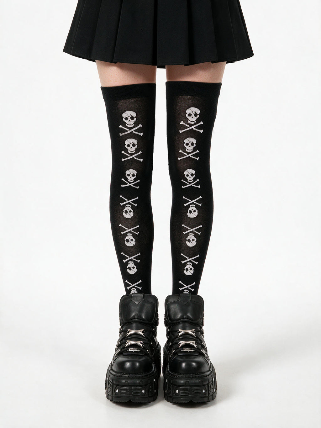 Black thigh high socks printed with white skulls and crossbones