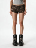 Brown washed denim shorts with zipped pockets