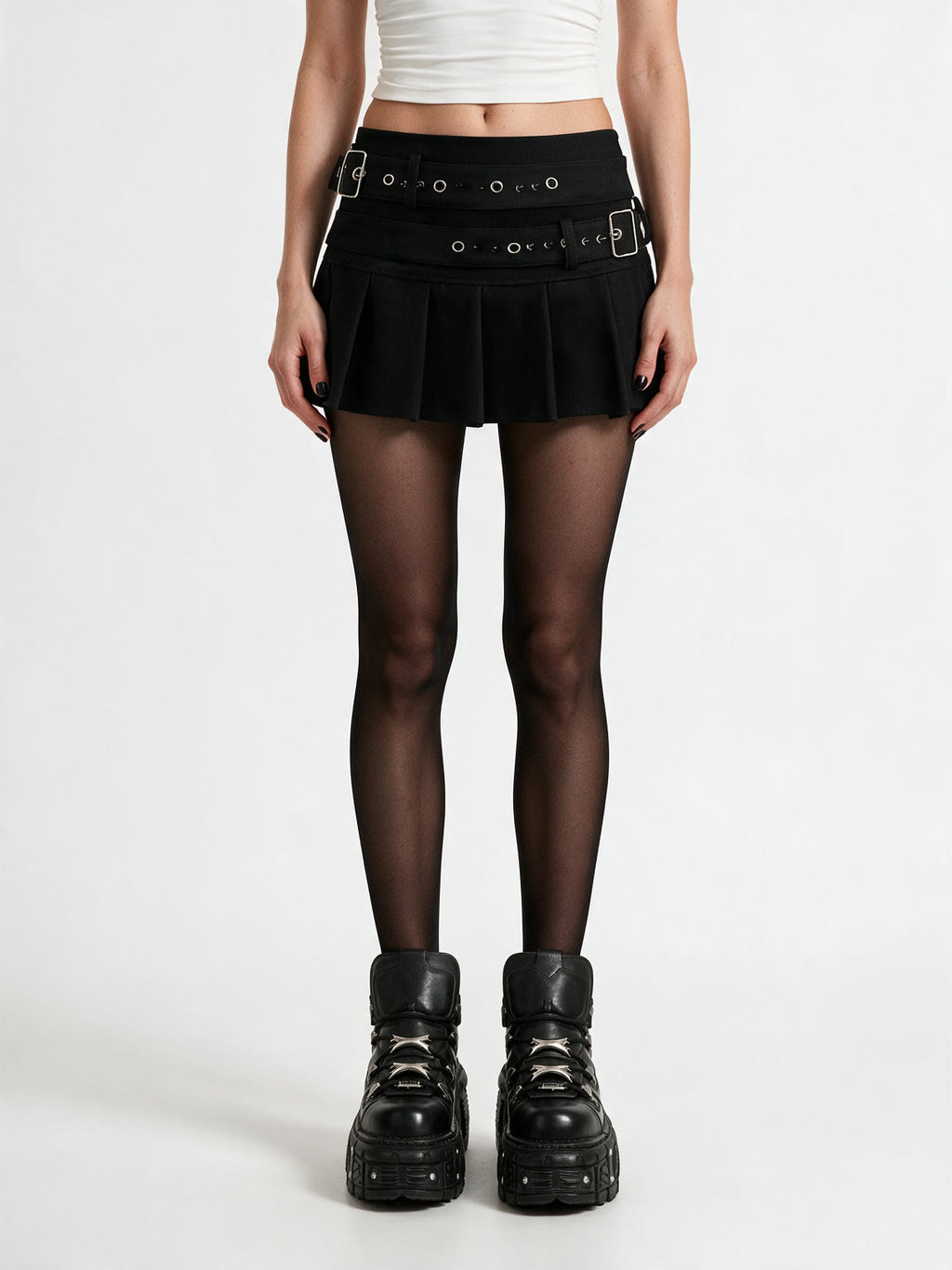 Black pleated mini skirt with two buckled eyelet belts