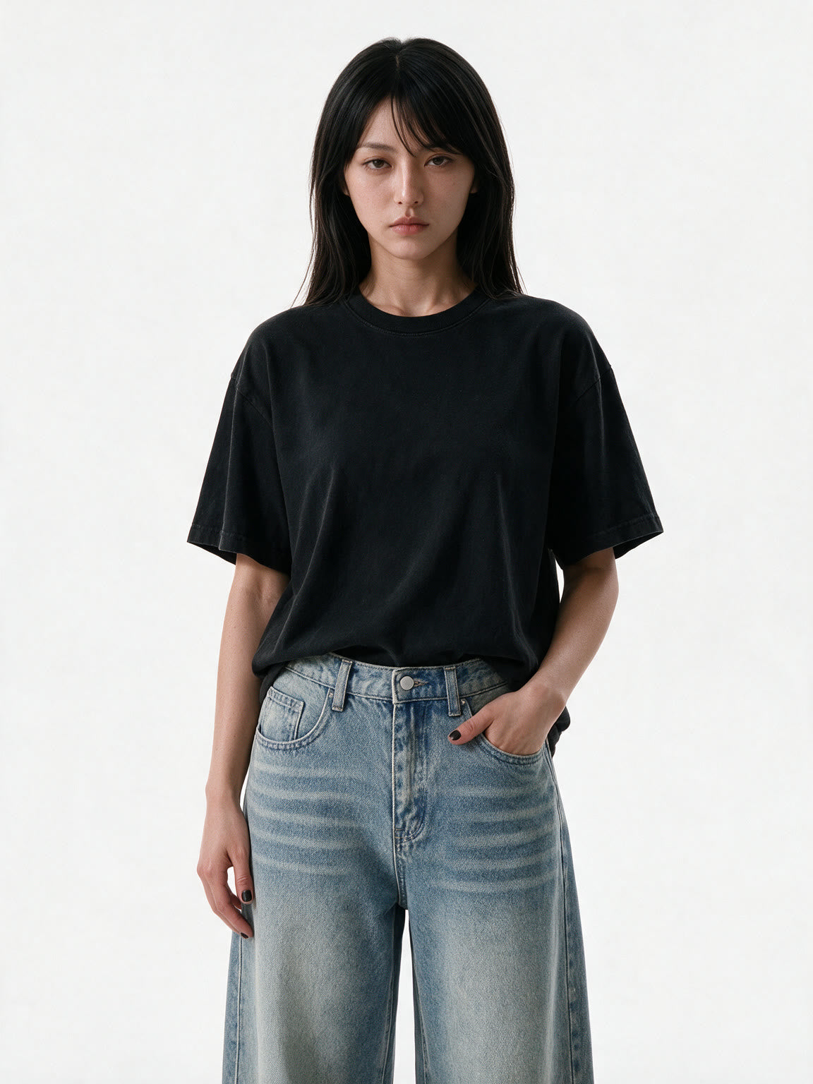 Washed black oversized tee with a skeletal back print