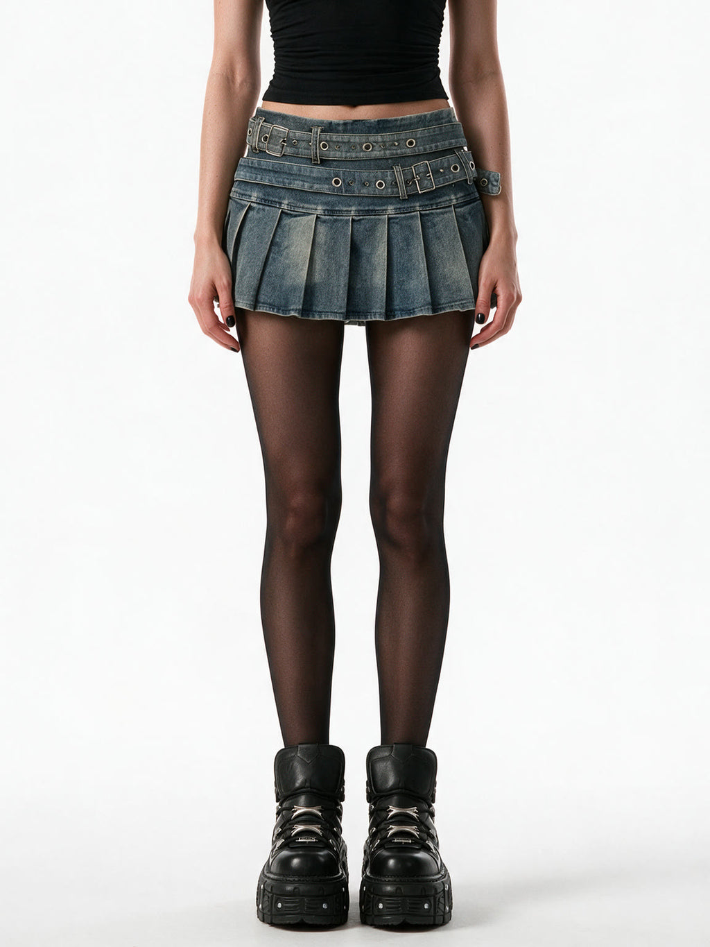 Washed denim pleated mini skirt with a riveted belt