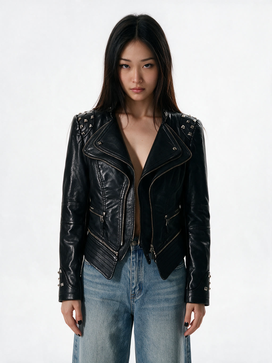 Cropped black leather moto jacket with studded shoulders