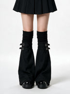 Black knit leg warmers with buckled flare panels