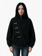Black stand collar jacket with silver toggle clasps