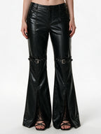 Black faux leather flare trousers with knee buckle straps