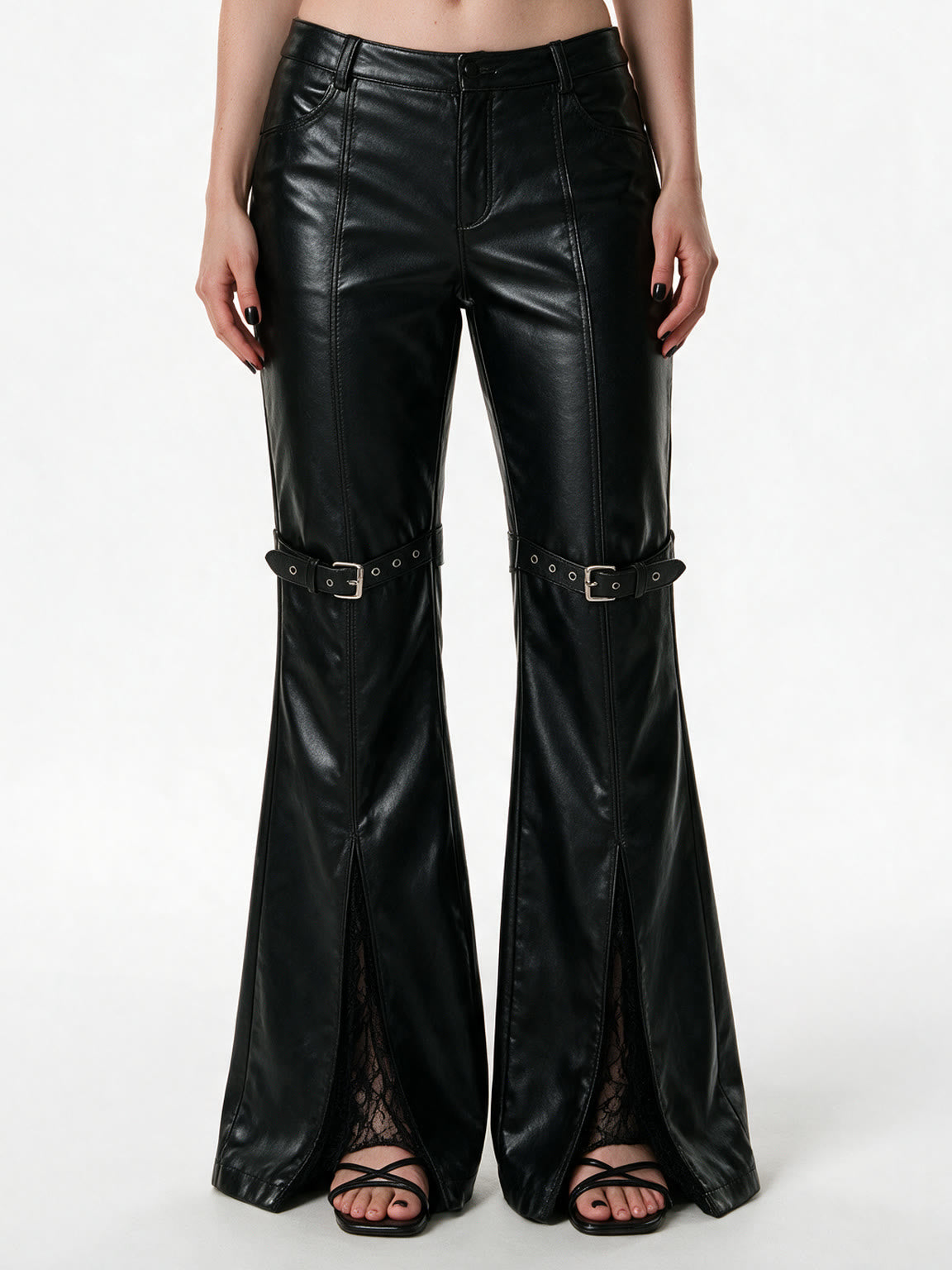 Black faux leather flare trousers with knee buckle straps