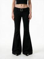 Black high waist flare trousers with a studded belt