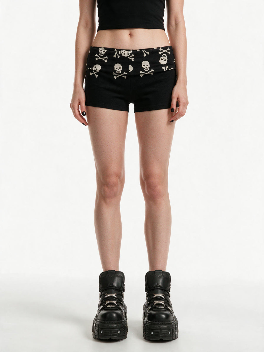Black shorts with a skull and crossbones printed waistband