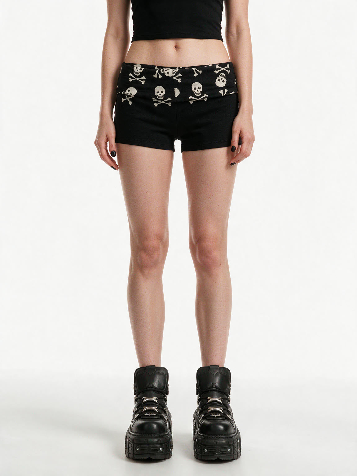 Black shorts with a skull and crossbones printed waistband