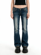 Blue bootcut jeans with crystal set back pockets