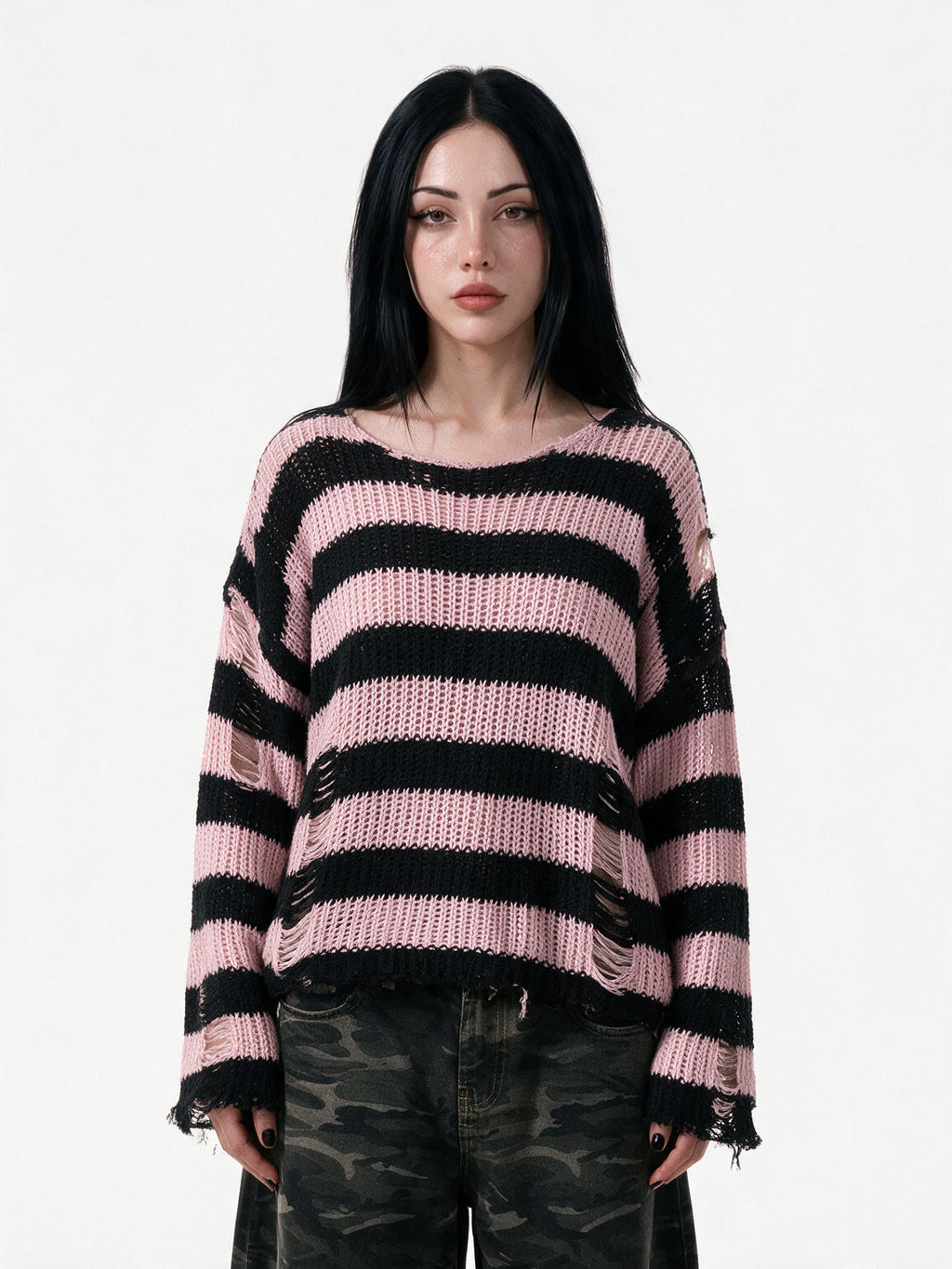 Oversized pink and black striped distressed knit sweater