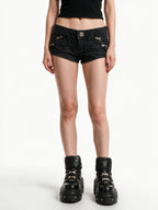 Washed black denim micro shorts with exposed zips