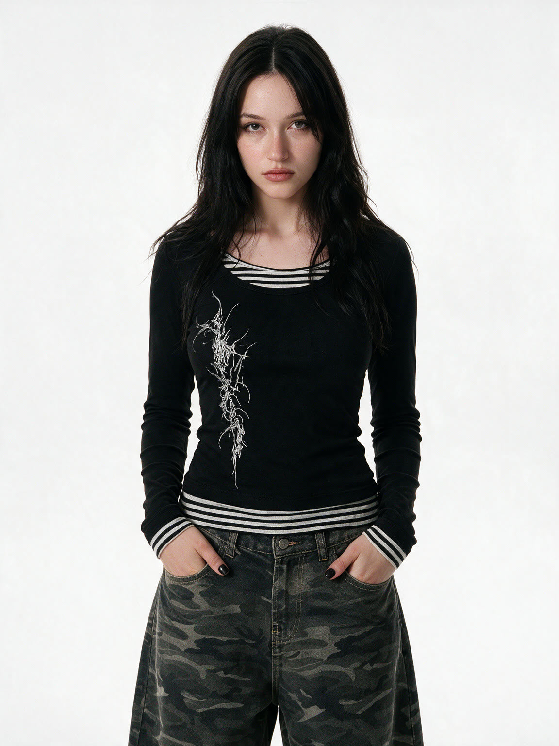 Black long sleeve top with false striped layer and tattoo print