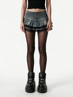 Washed denim tiered mini skirt with black lace trim