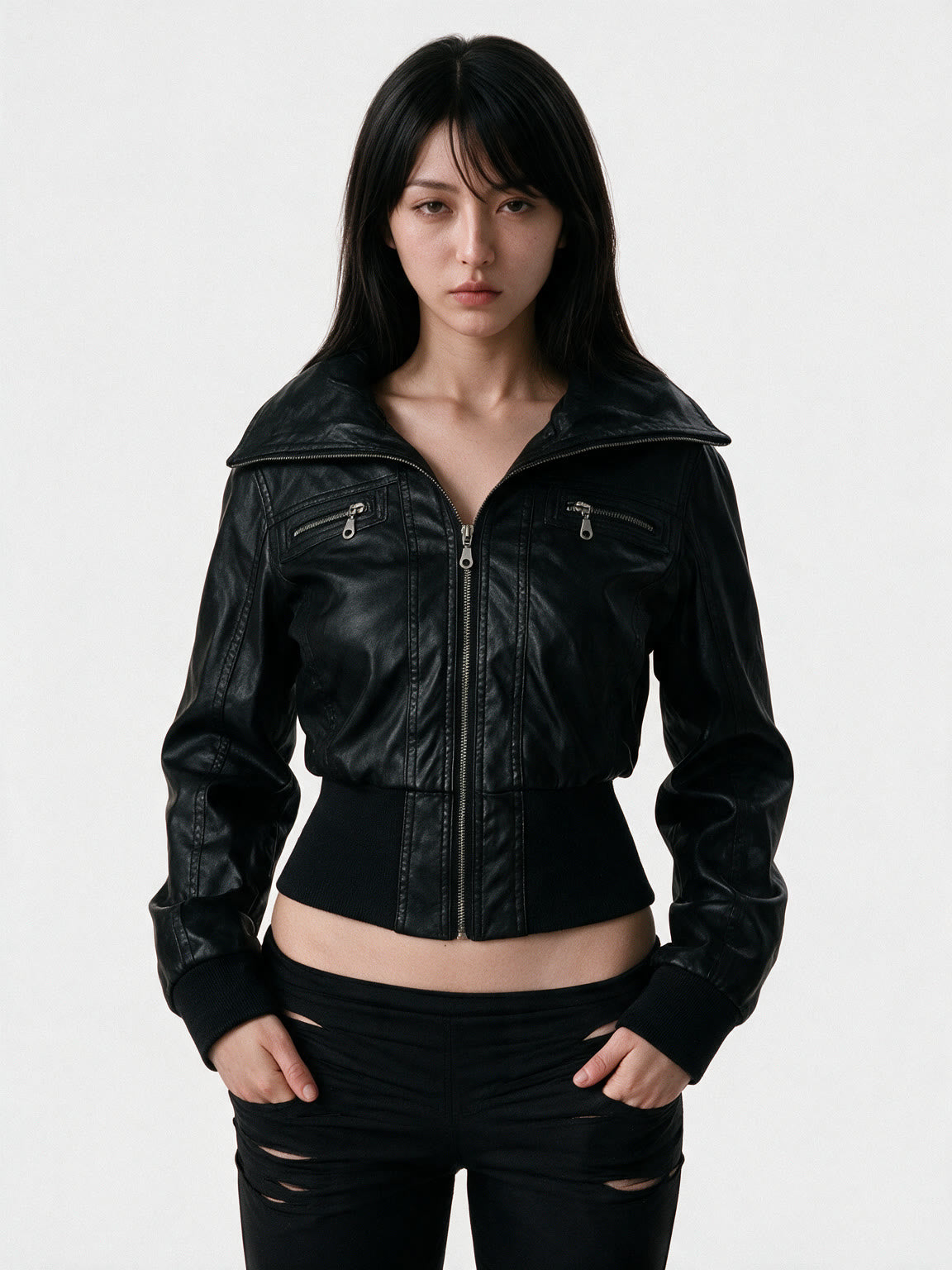 Black leather bomber jacket with a wide collar and ribbed hem