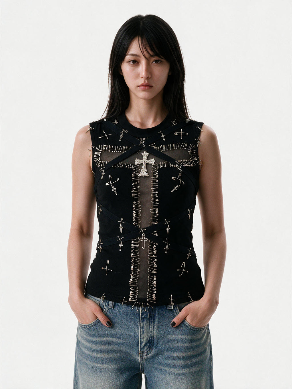 Black bustier tank with safety pins and a studded cross