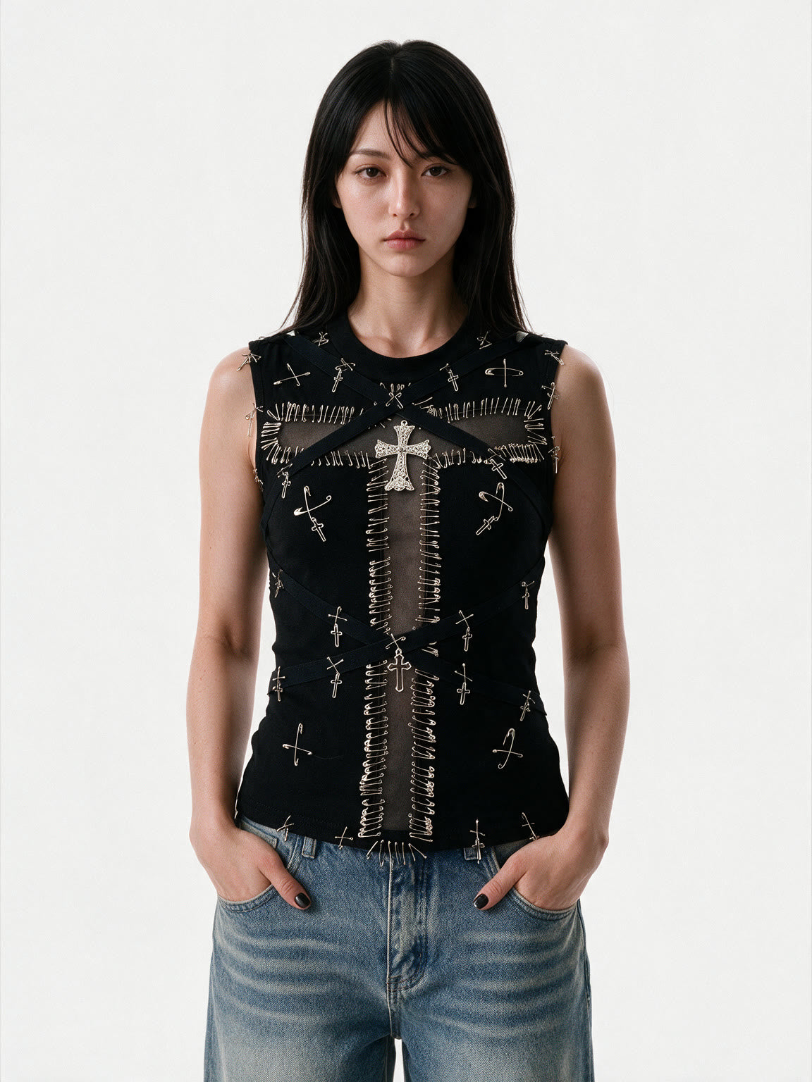 Black bustier tank with safety pins and a studded cross