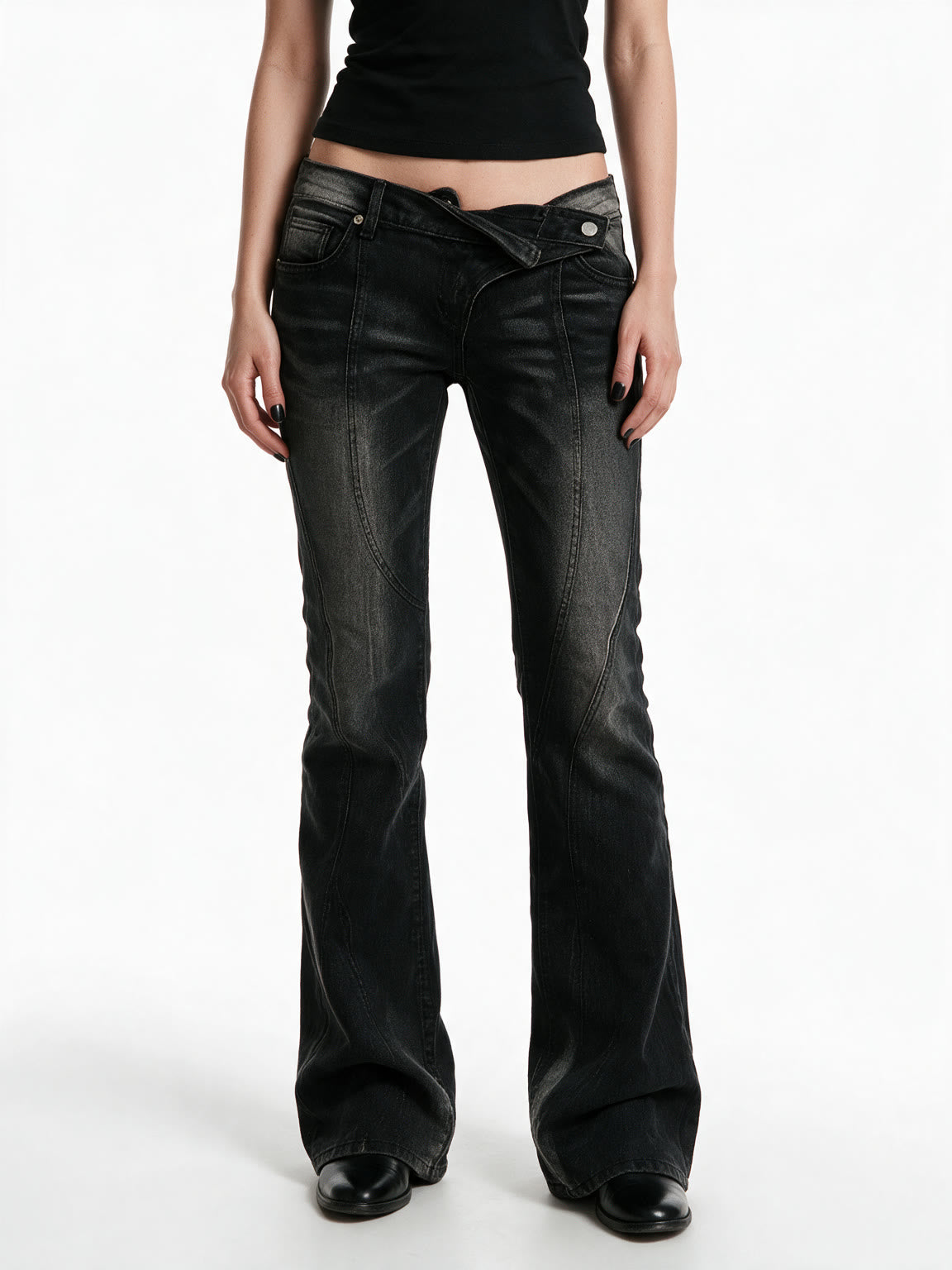 Washed black flare jeans with an asymmetric waistband